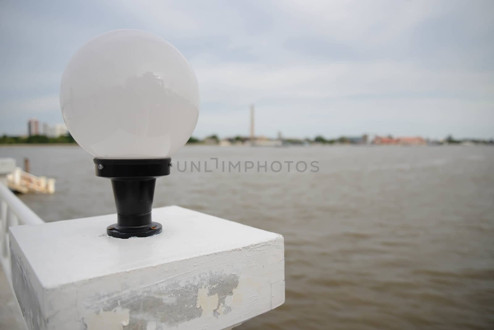 White lamp and the river