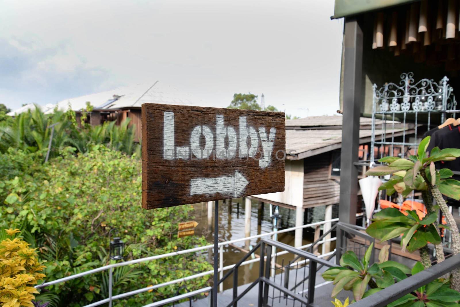 Wood signs to Lobby