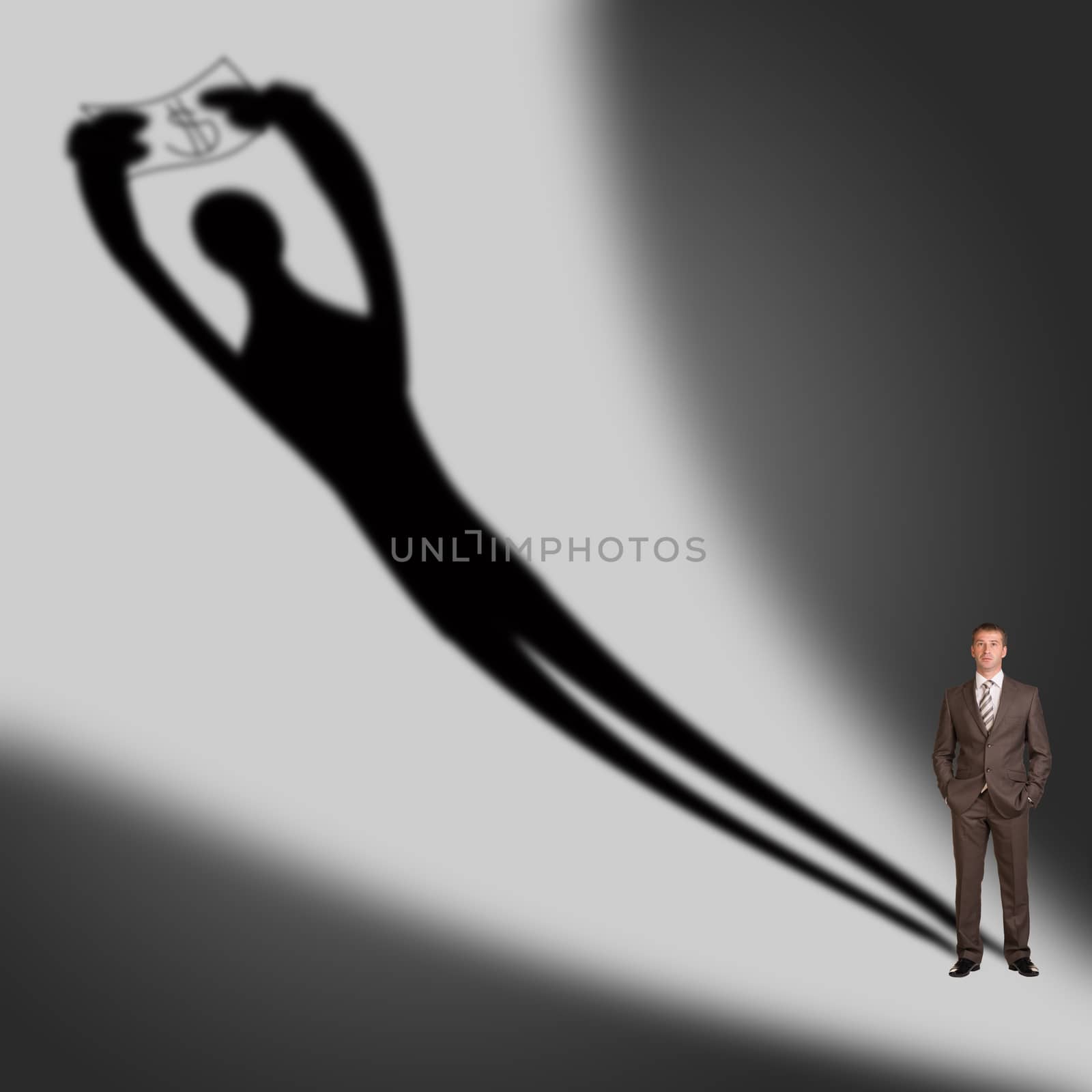 Businessman with shadow by cherezoff