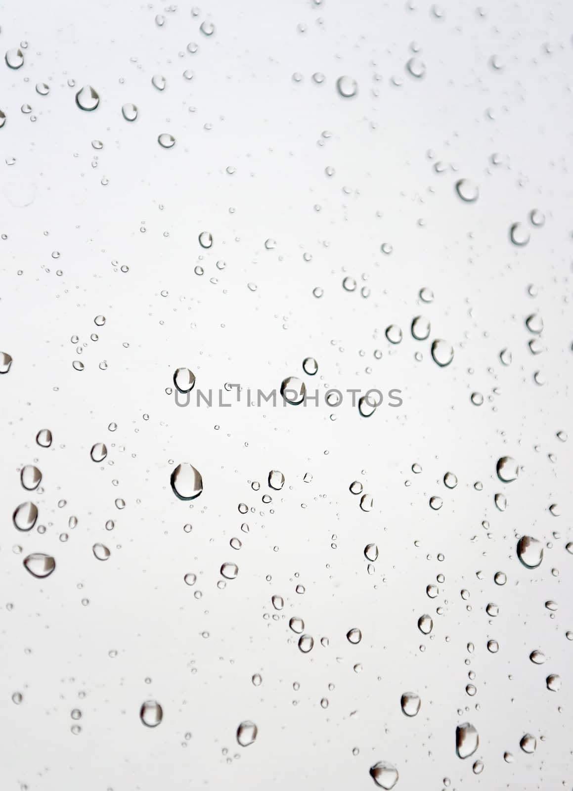 Water drops on the window. Abstract background. Shallow DOF.