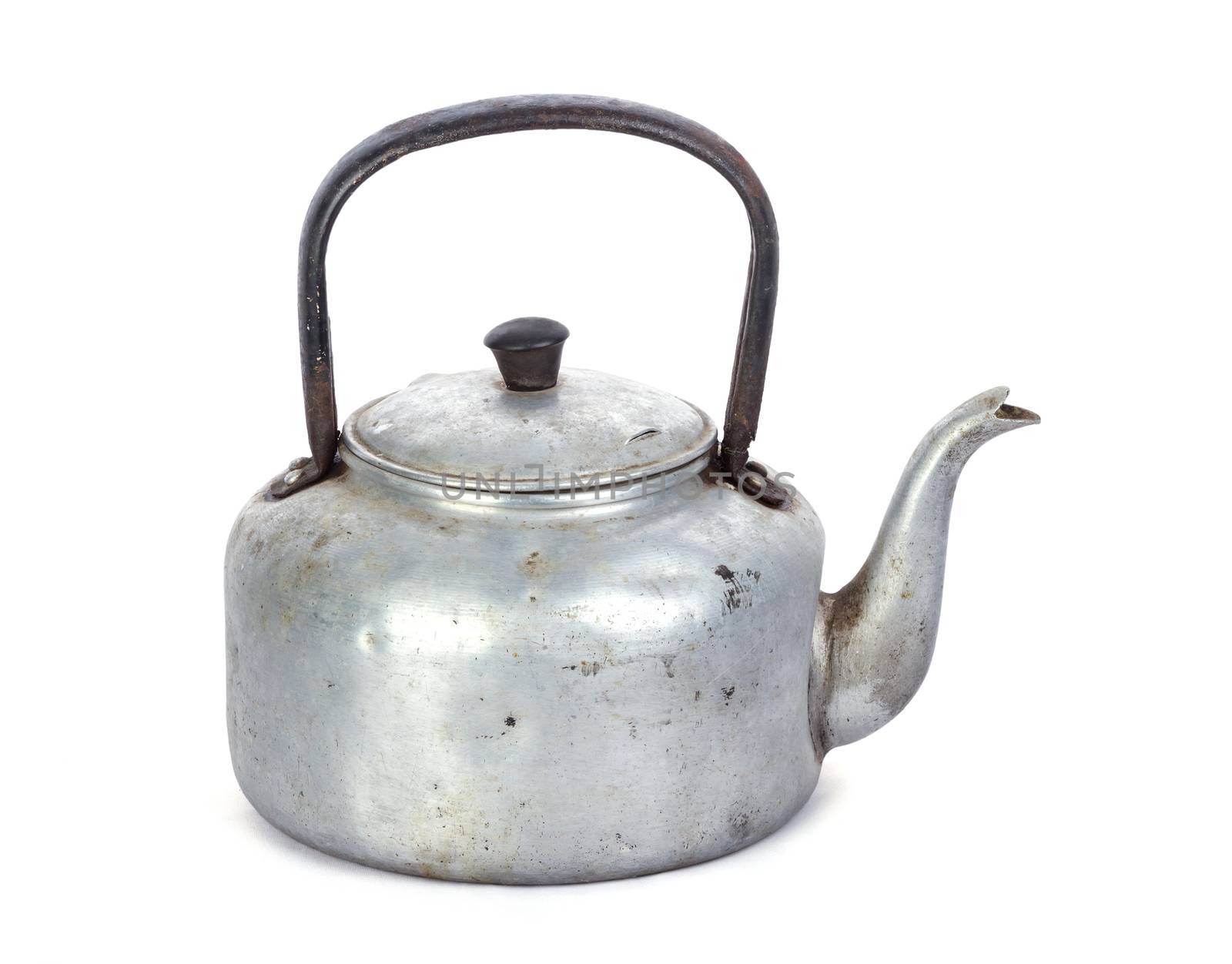 old dirty classic aluminum kettle on white background