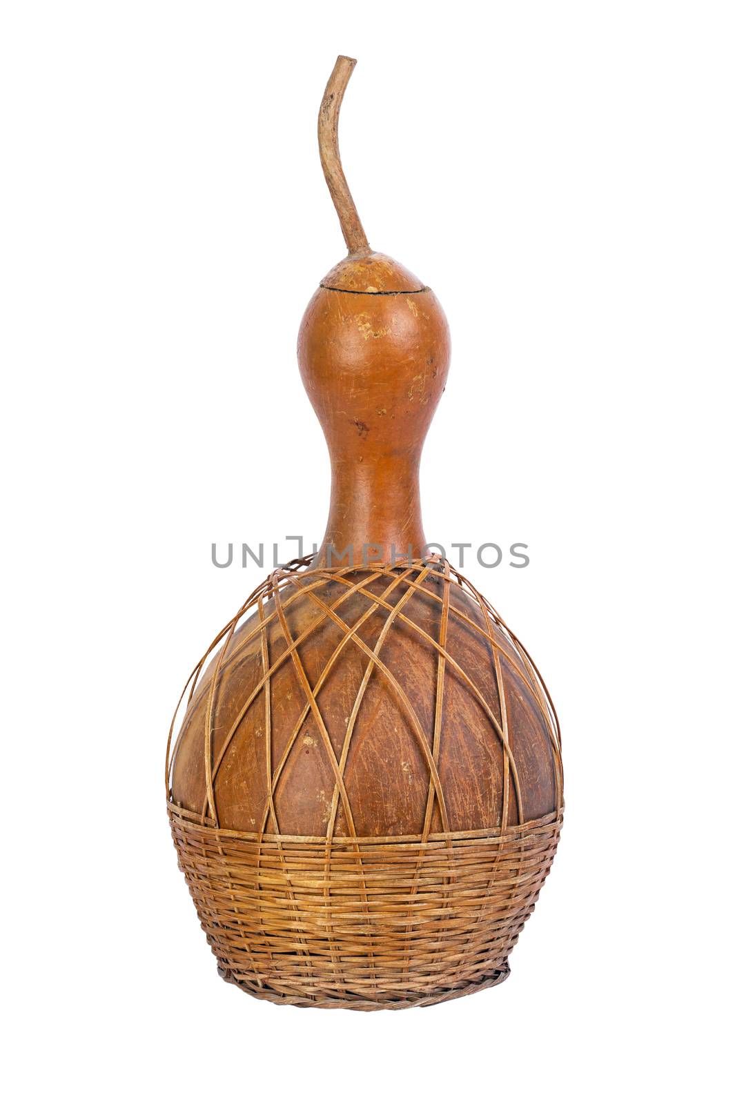 dried bottle gourd used for traditional canteen for drinking water with wickerwork cover