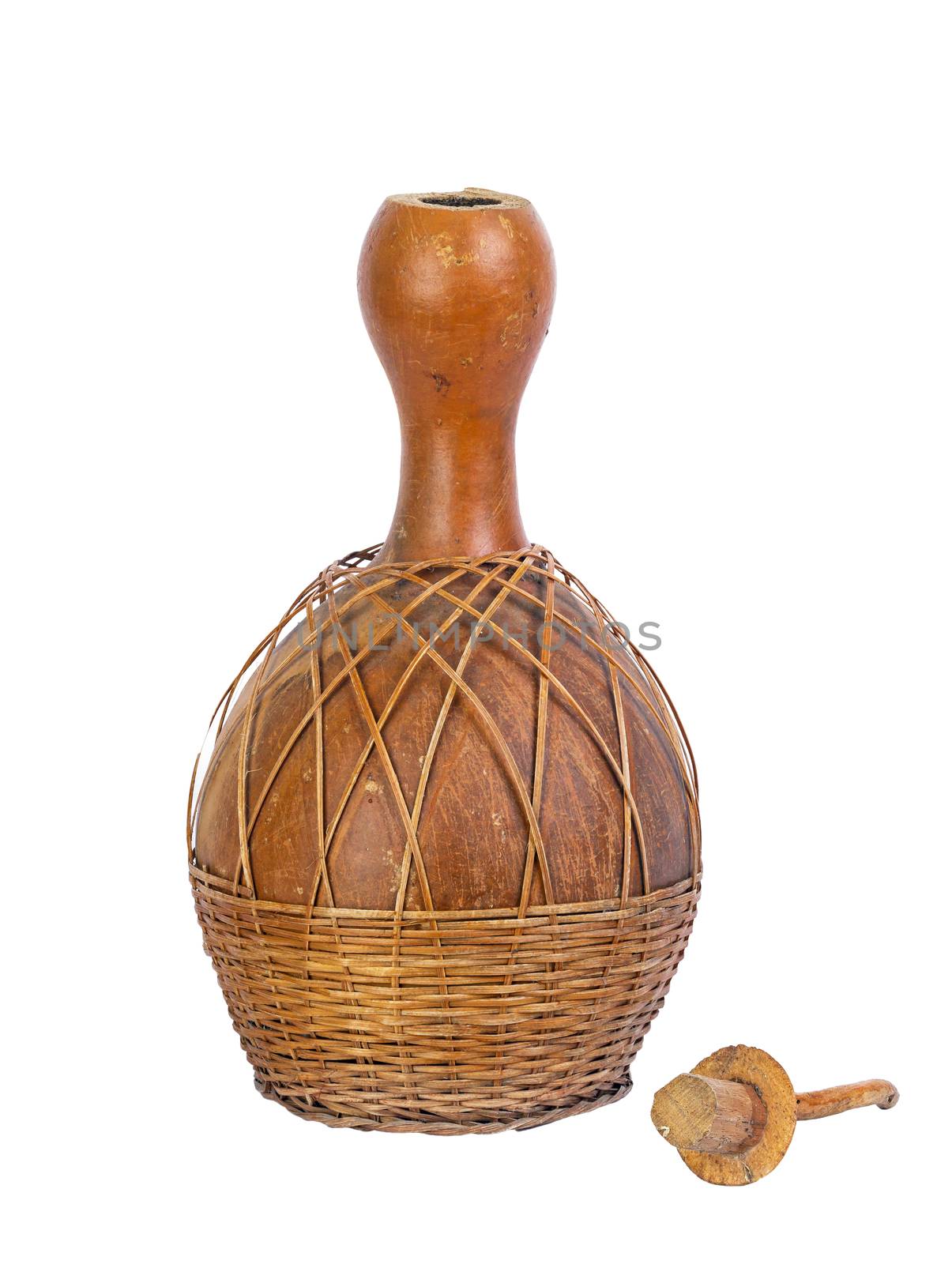 dried bottle gourd used for traditional canteen for drinking water with wickerwork cover