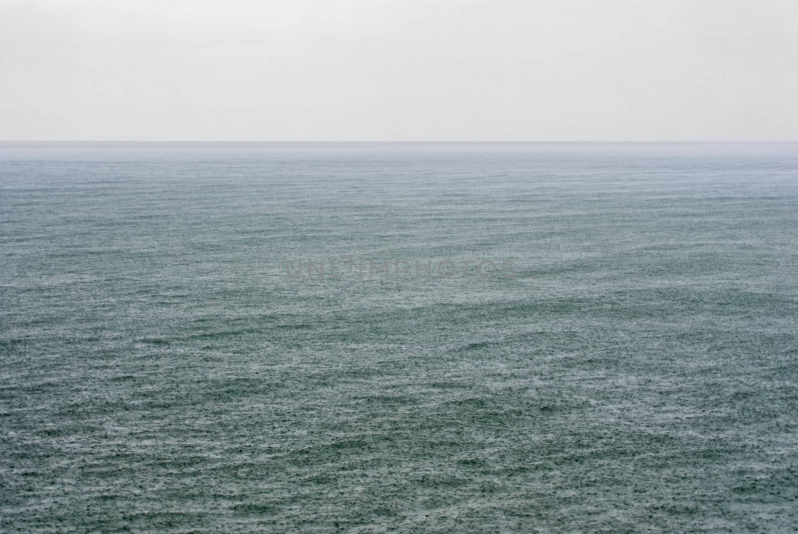 Rain shower on open sea