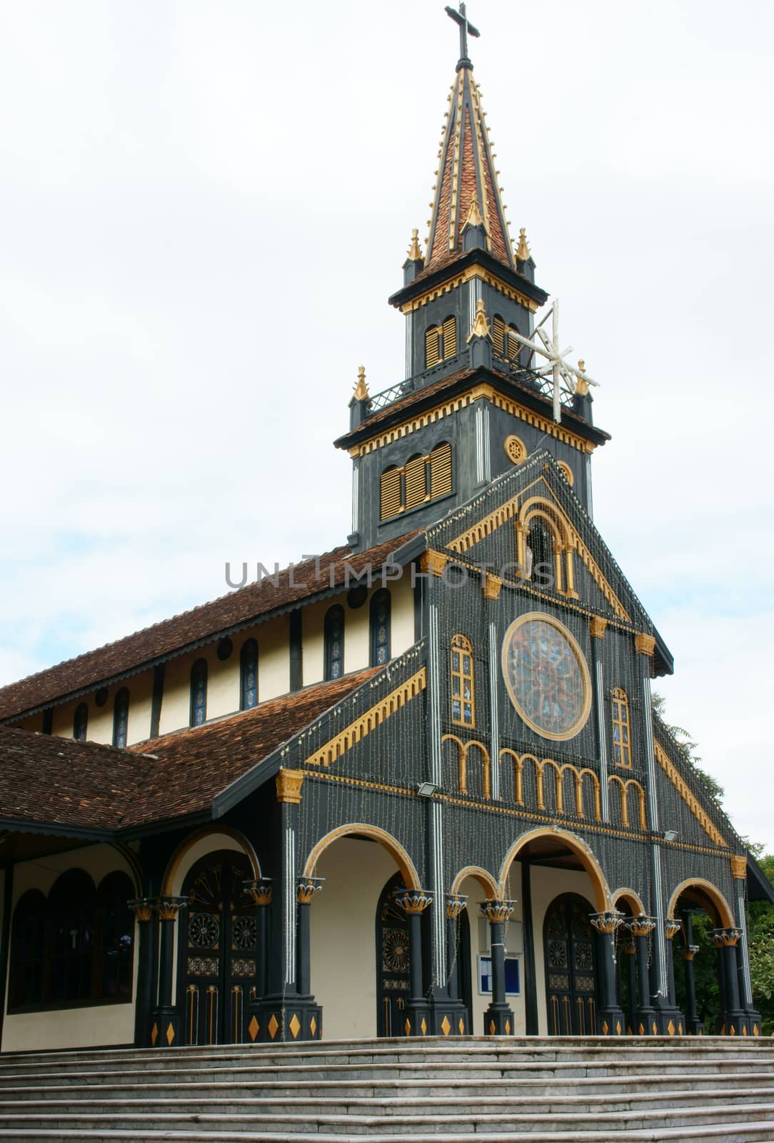 KON TUM, VIET NAM- AUG 22: Kontum wooden church, 100 years old, an ancient cathedral, religion heritage, famous place for travel, amazing architect make wonderful landscape, Vietnam, Aug 22, 2015