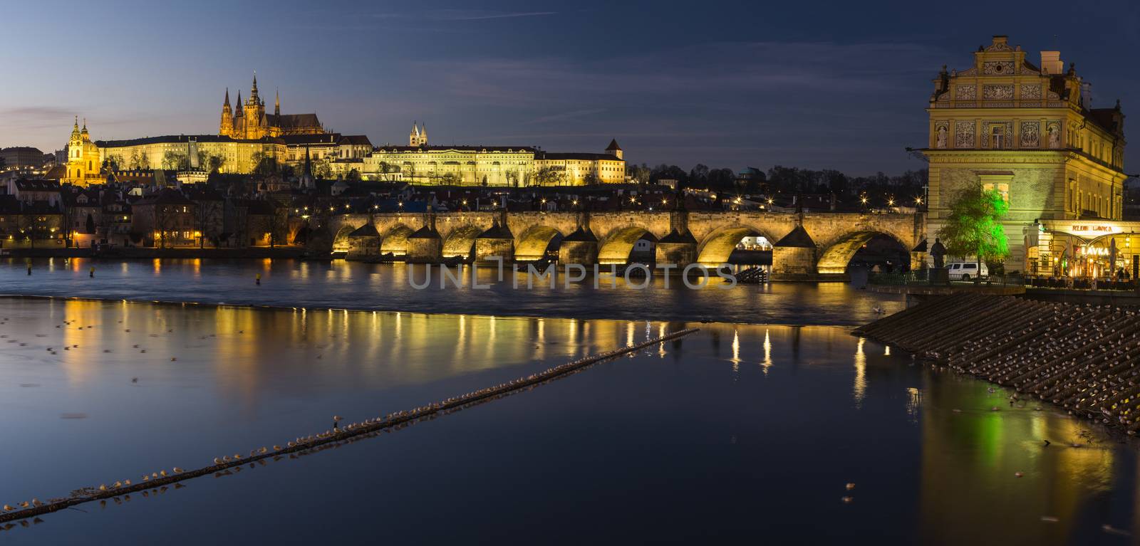 Cityscape of Prague with Castle and Charles Bridge at sunset, Czech Republic by A-dam
