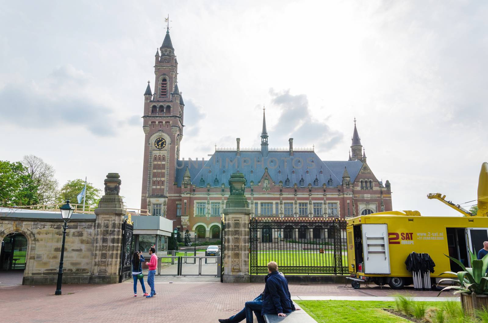 The Hague, Netherlands - May 8, 2015: Reporters at The Peace Palace in The Hague, Netherlands. It is often called the seat of international law because it houses the International Court of Justice.