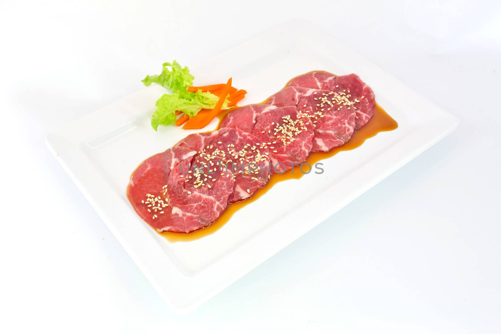 High grade sliced Hida wagyu beef isolated on white background