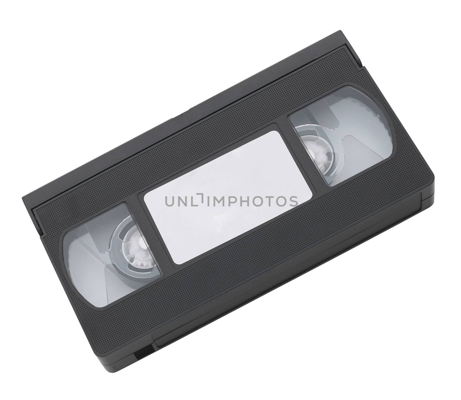 Old VHS video cassette tape with blank label for copyspace