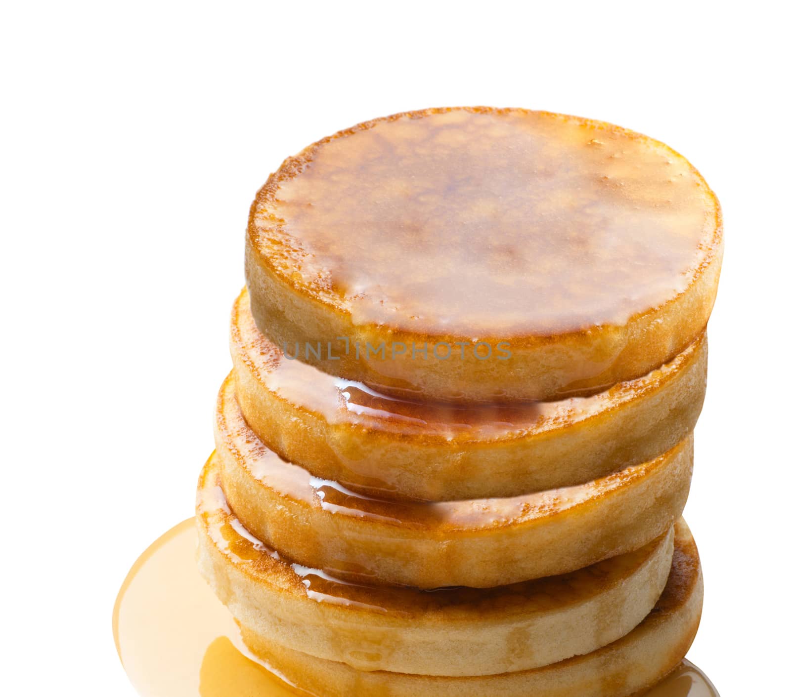 stack of pancakes with syrup by ozaiachin