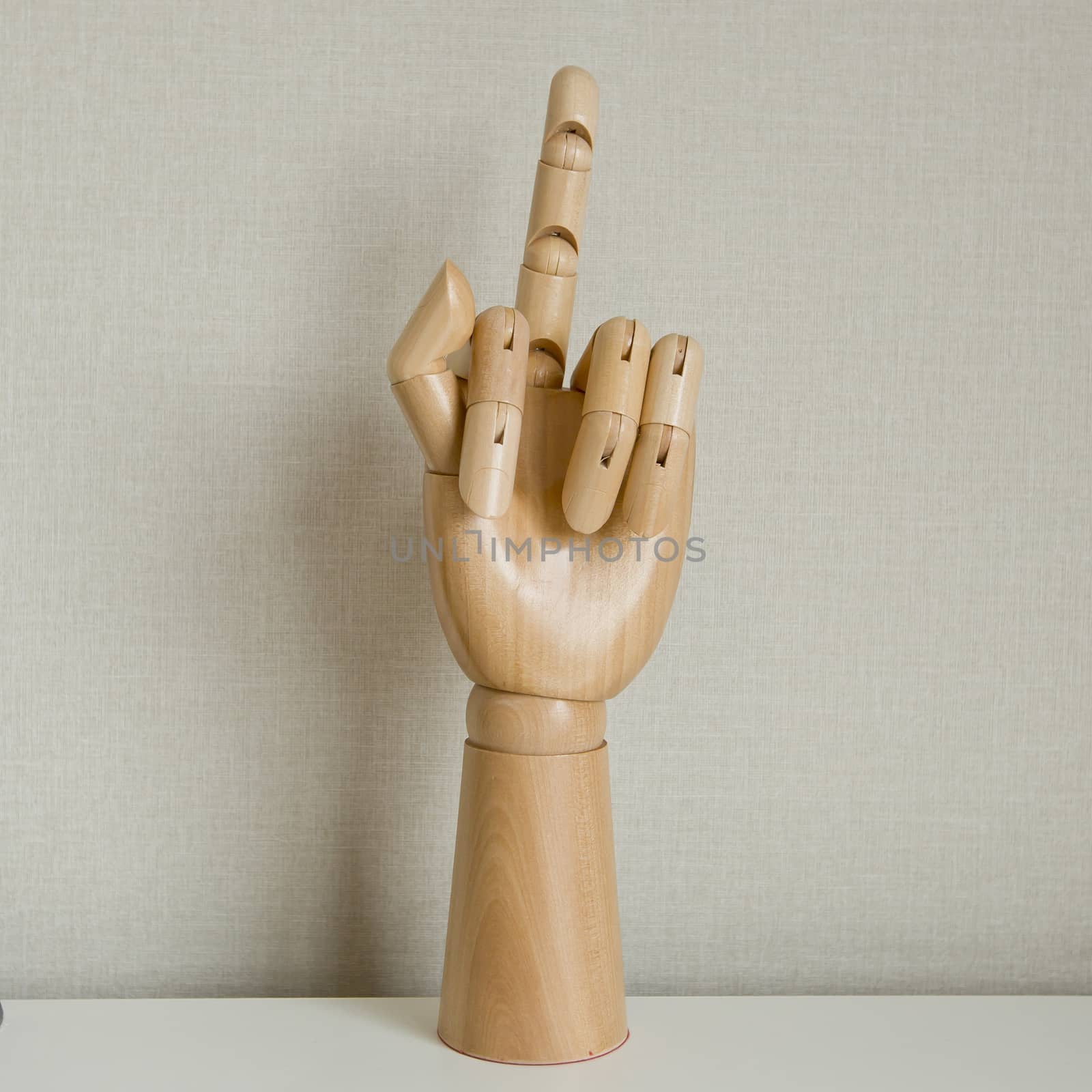 Hand Gesturing With Middle Finger On White Background