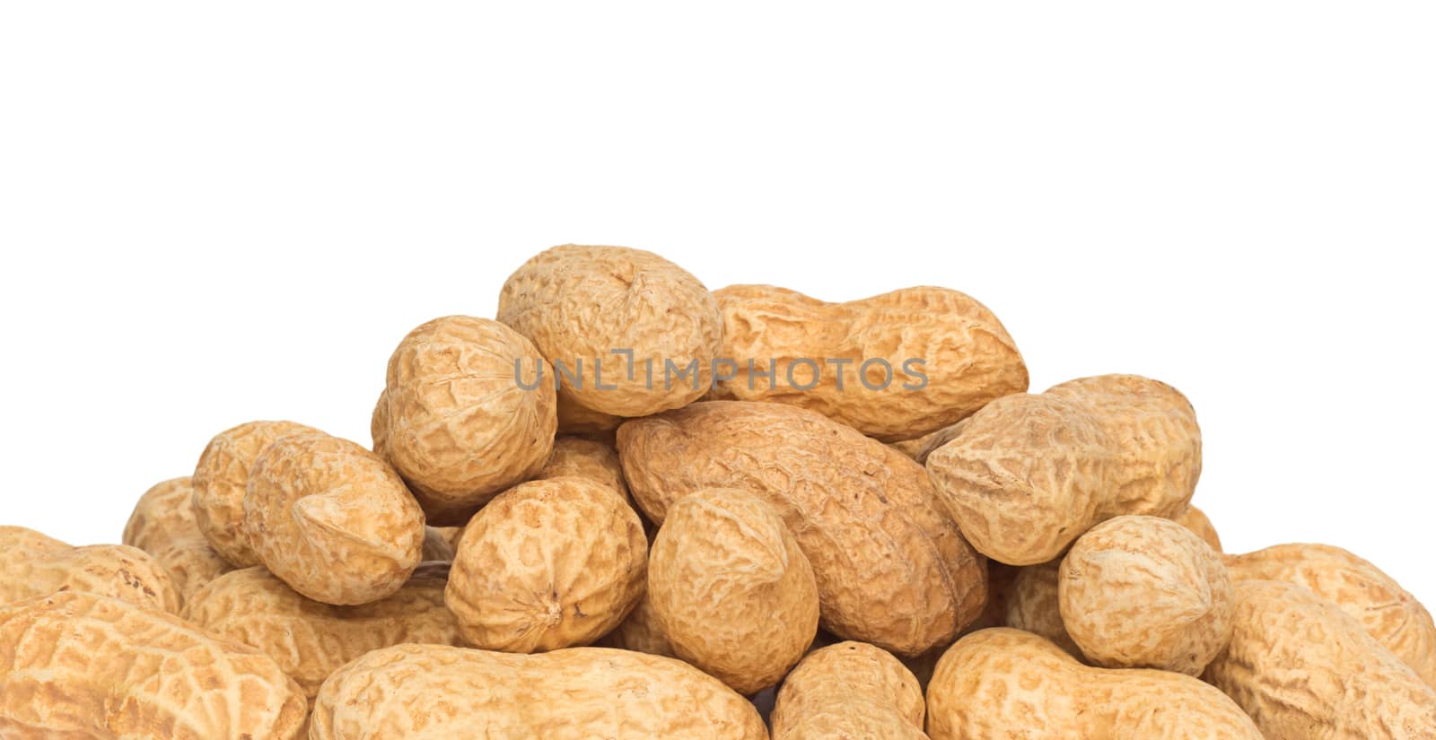 Dried peanuts in closeup by ozaiachin