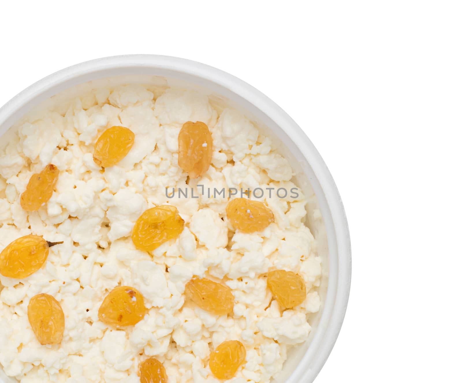 cheese in plastic container with raisins by ozaiachin