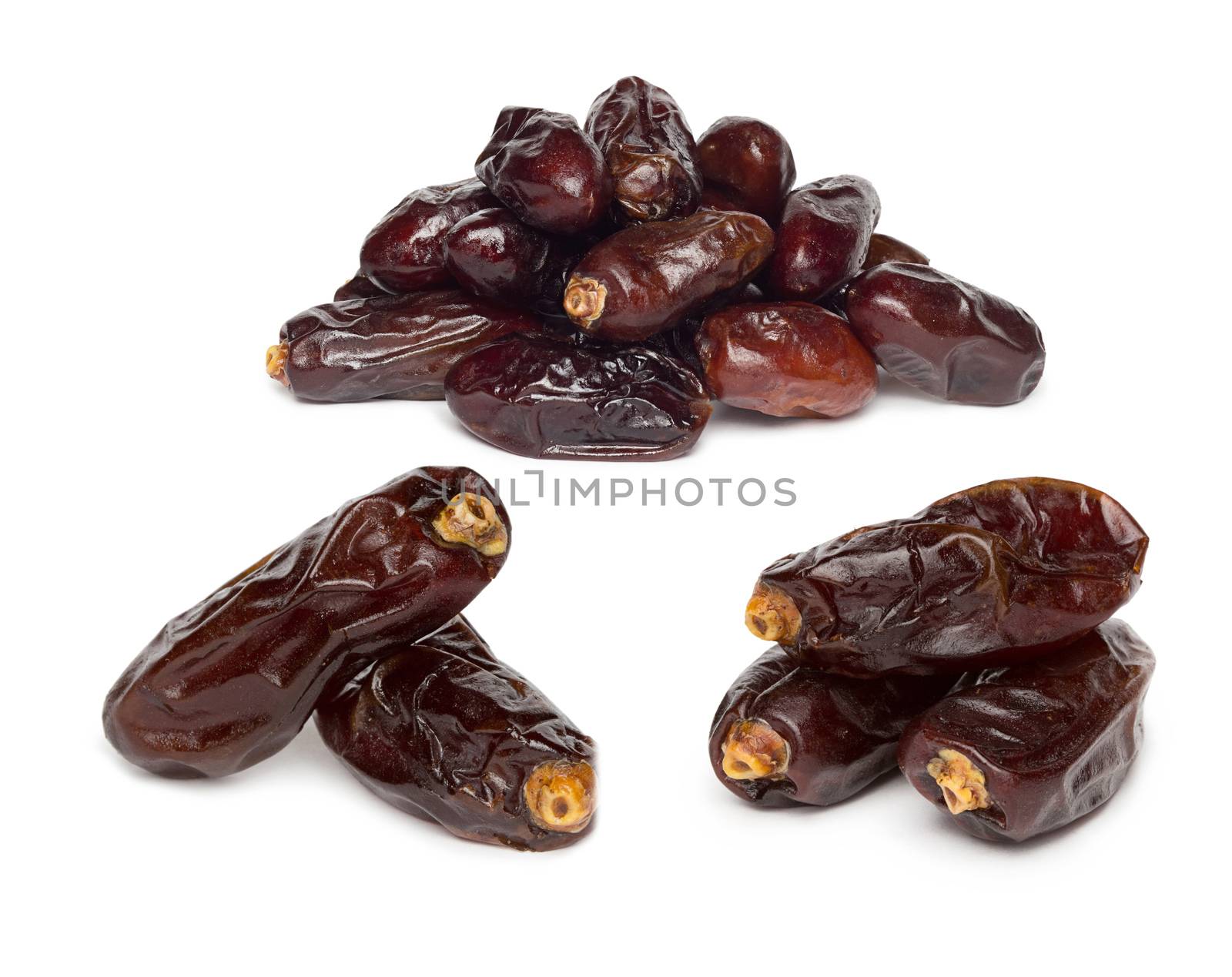 Fresh dates over white background by ozaiachin