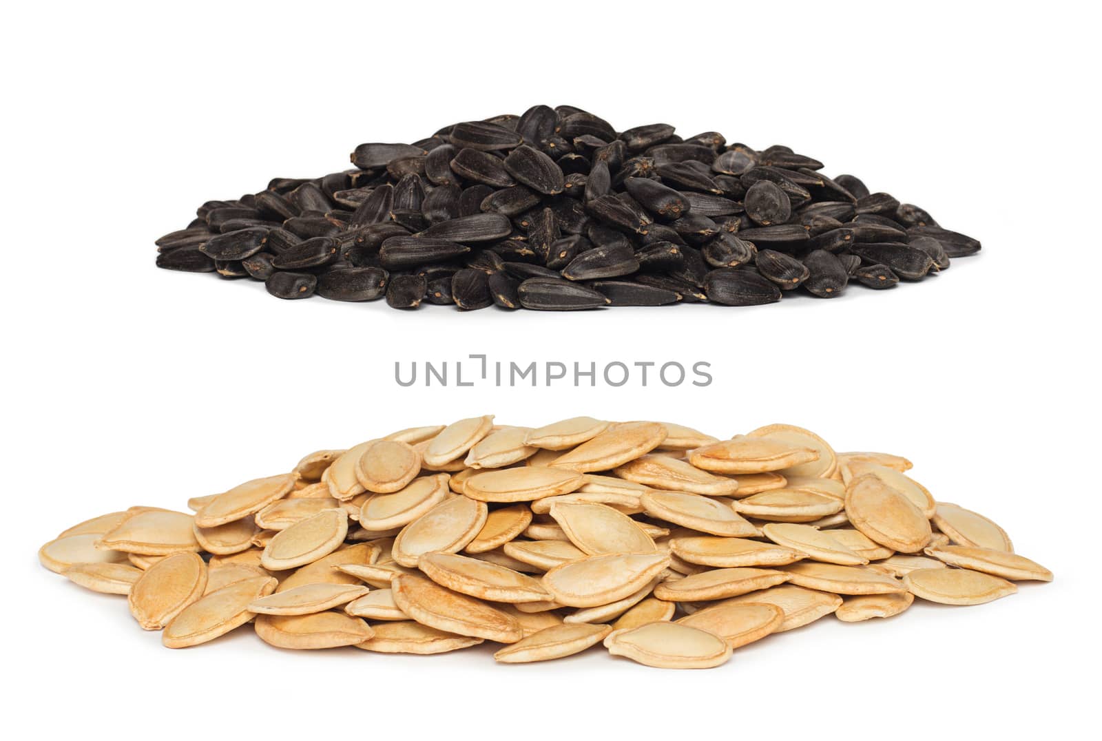 pile of sunflower with pumpkin seeds isolated