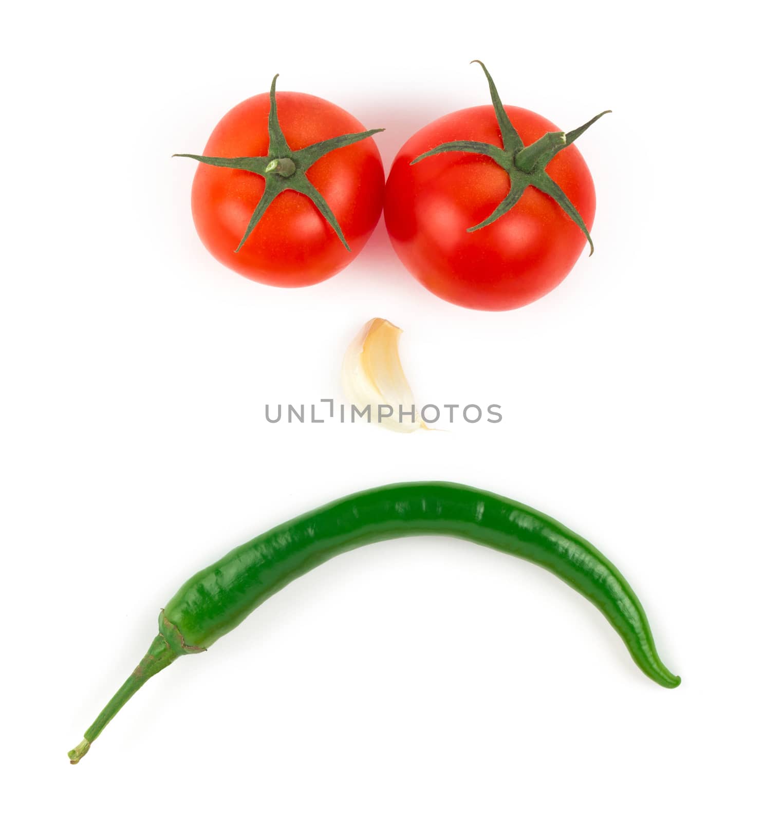 Chili pepper, garlic and tomatos isolated on white background