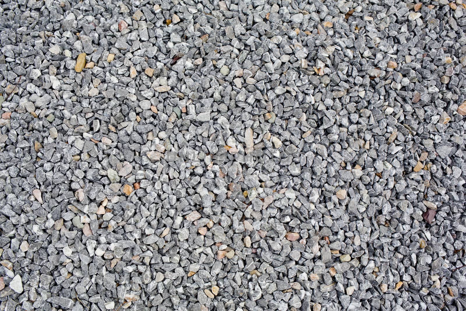 background made of a closeup of a pile of pebbles