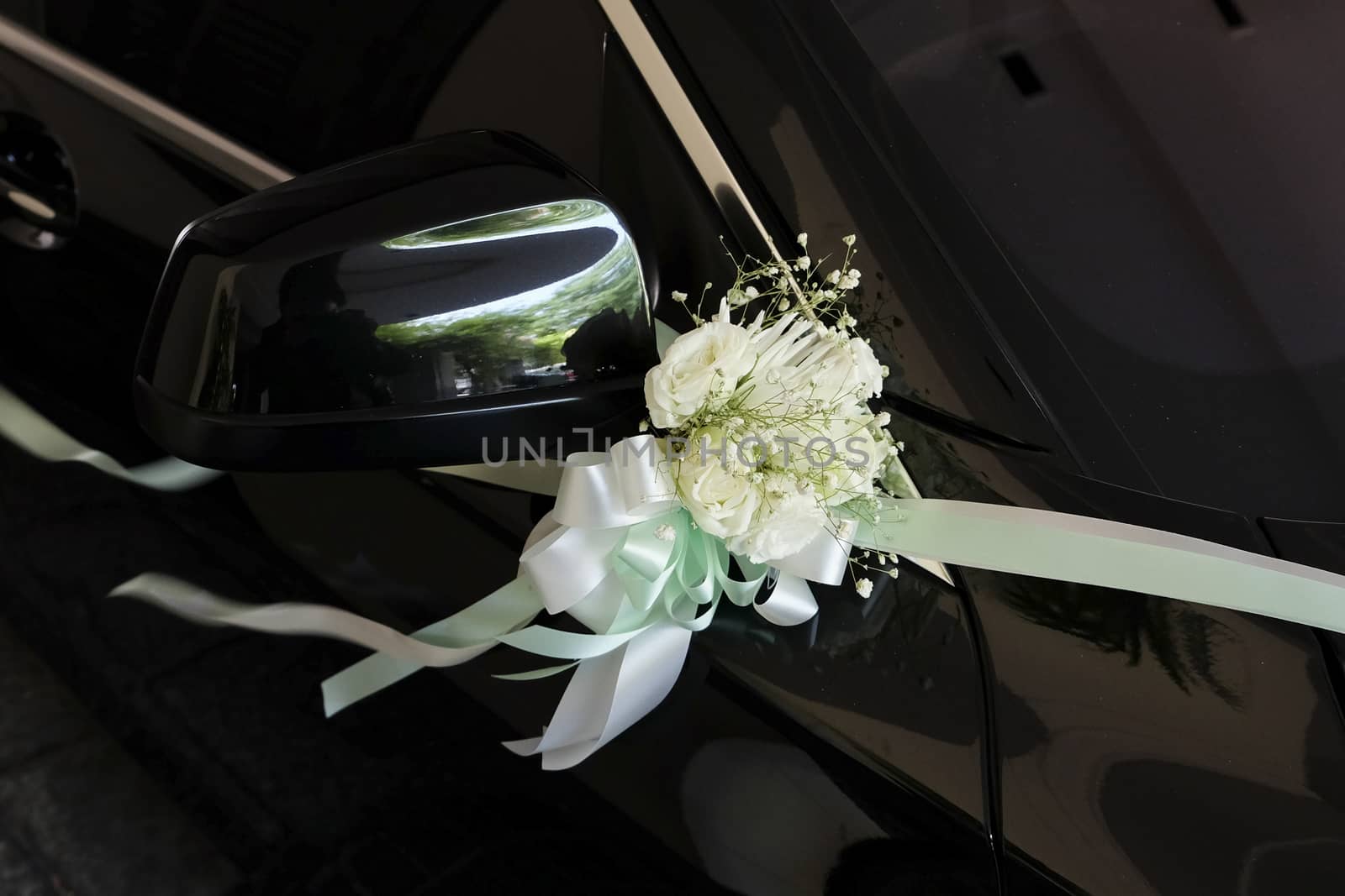 Flower bouquet on a wedding car