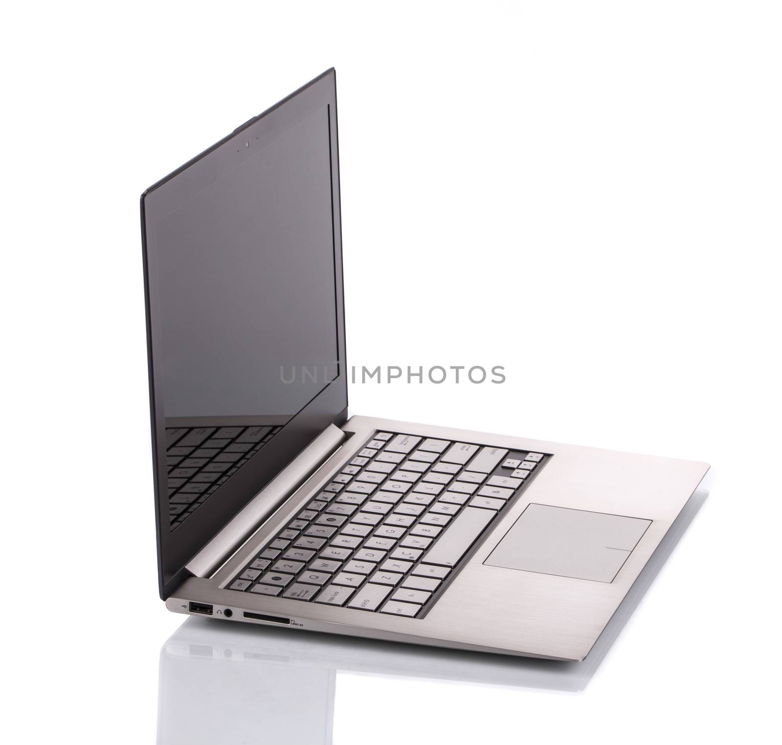 Laptop isolated on white background by ozaiachin