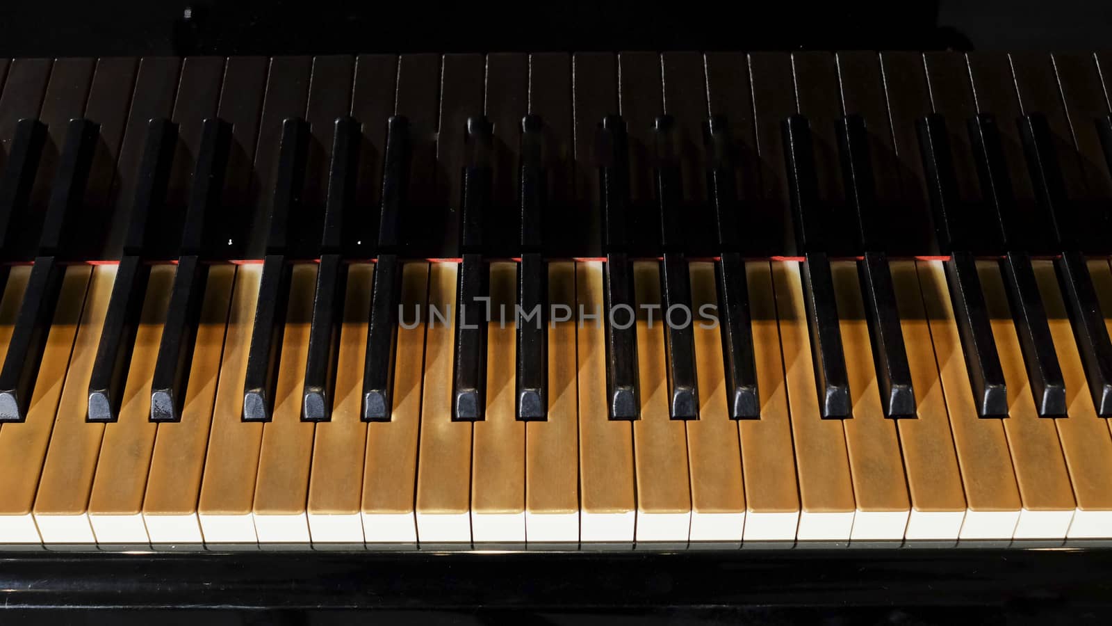 piano keys on black piano