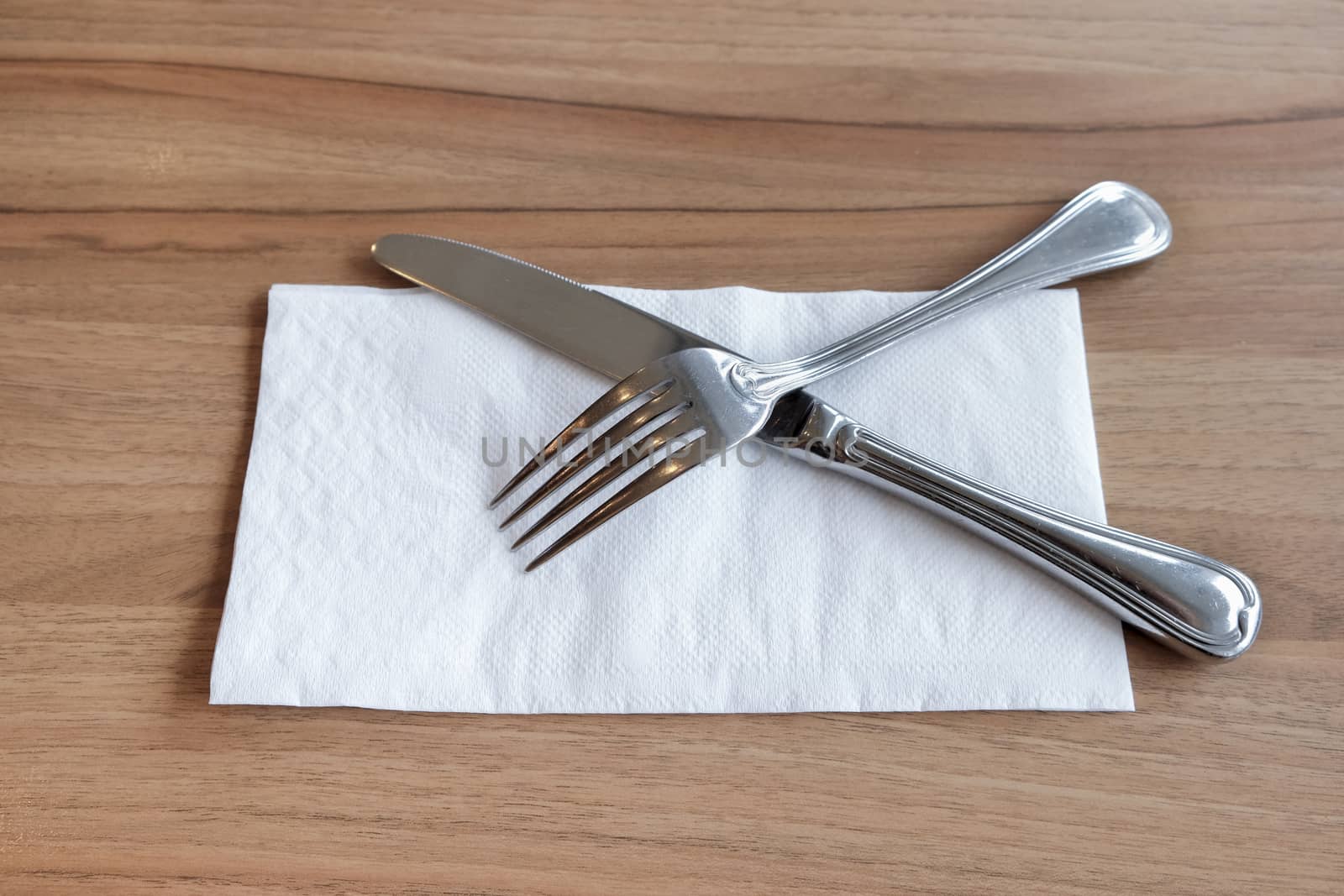 Fork and Knife Cutlery on white tissue by art9858