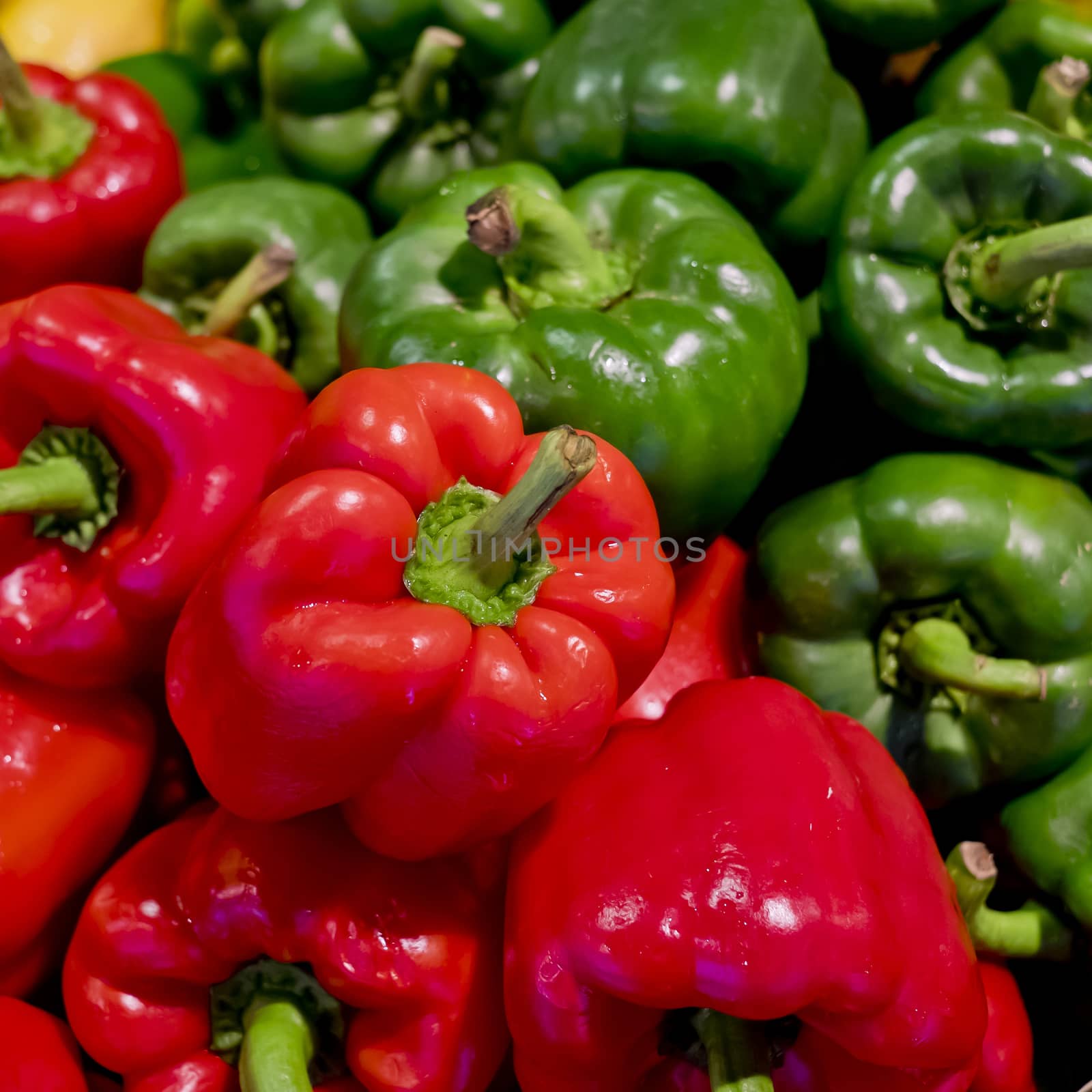 colorful bell peppers with green and red colors, natural backgro by art9858