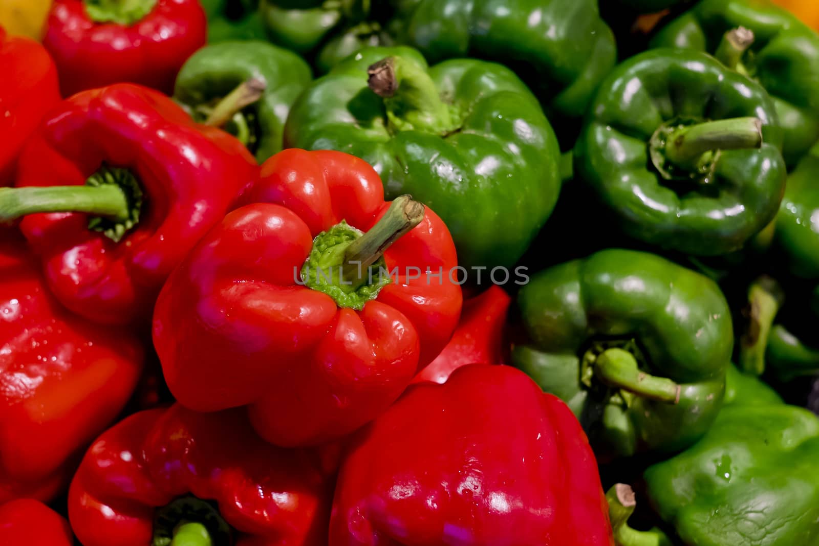 colorful bell peppers with green and red colors, natural backgro by art9858