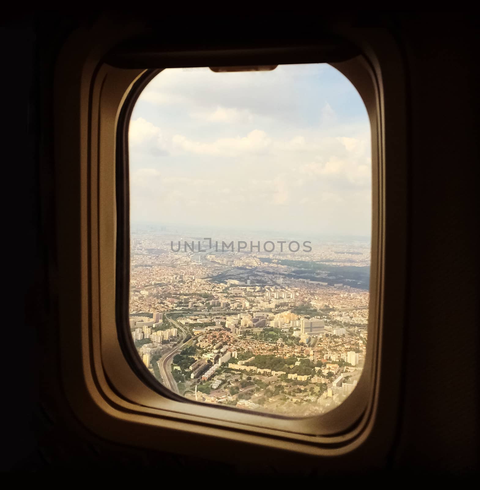 View over Paris from the airplane window by anikasalsera