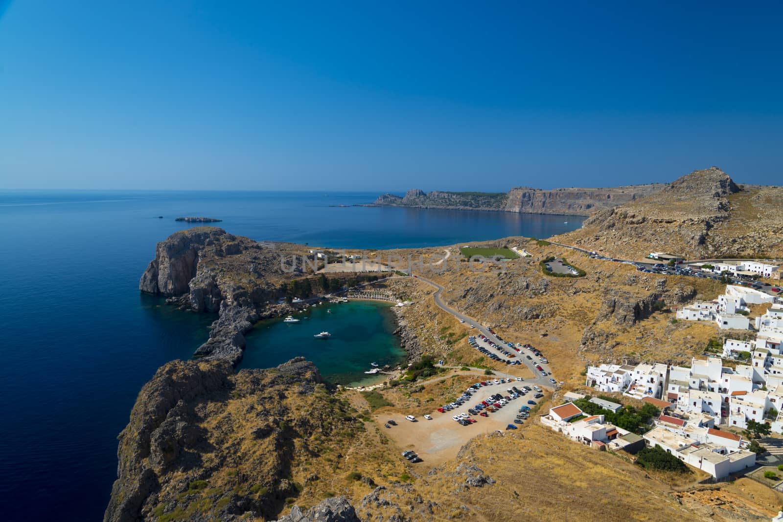 Beautiful blue-green bay seen fromthe heights of the Acropolis of Lindos