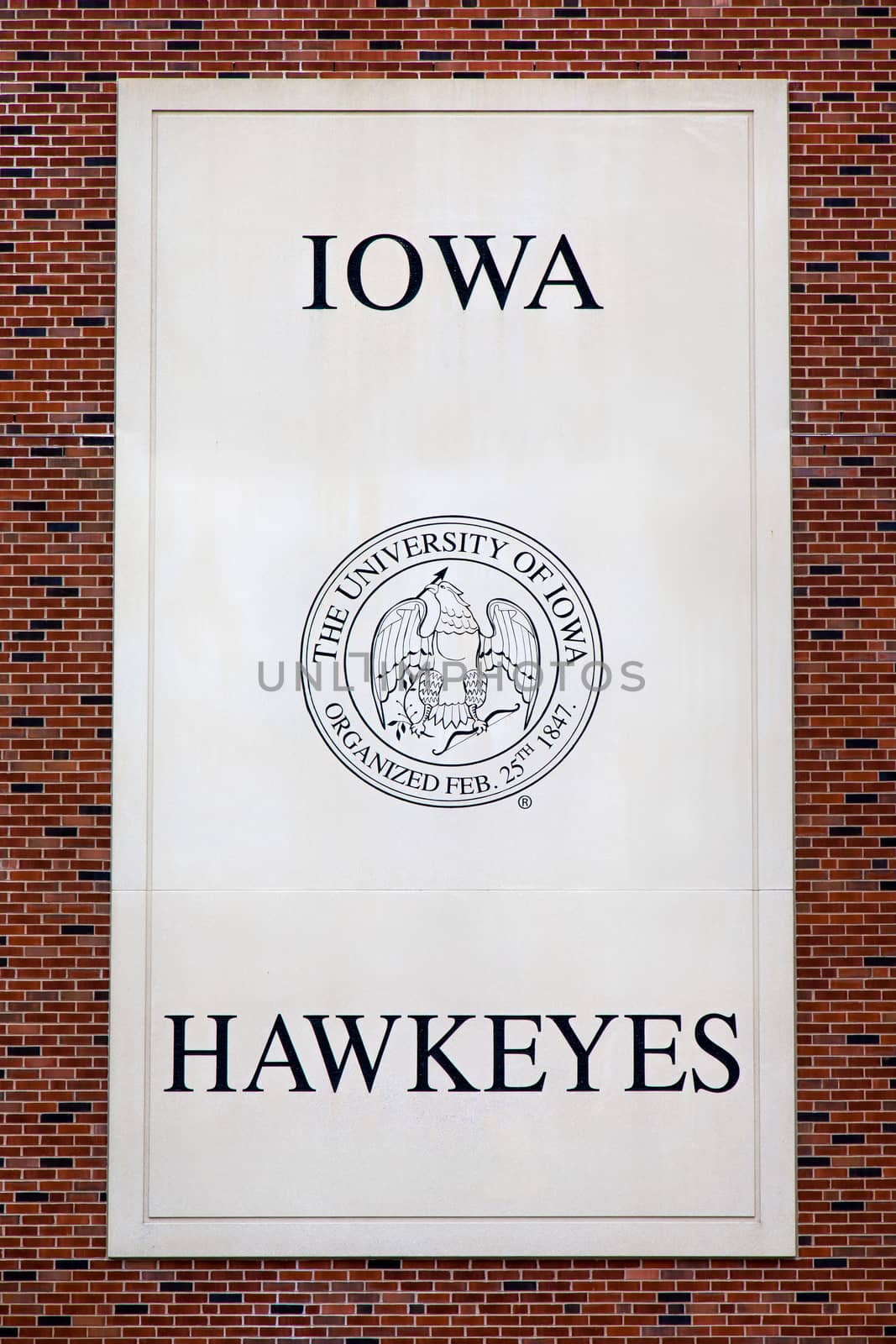 IOWA CITY, IA/USA - AUGUST 7, 2015: Iowa Hawkeyes emblem and seal at Kinnick Stadium at the University of Iowa. The University of Iowa is a flagship public research university.