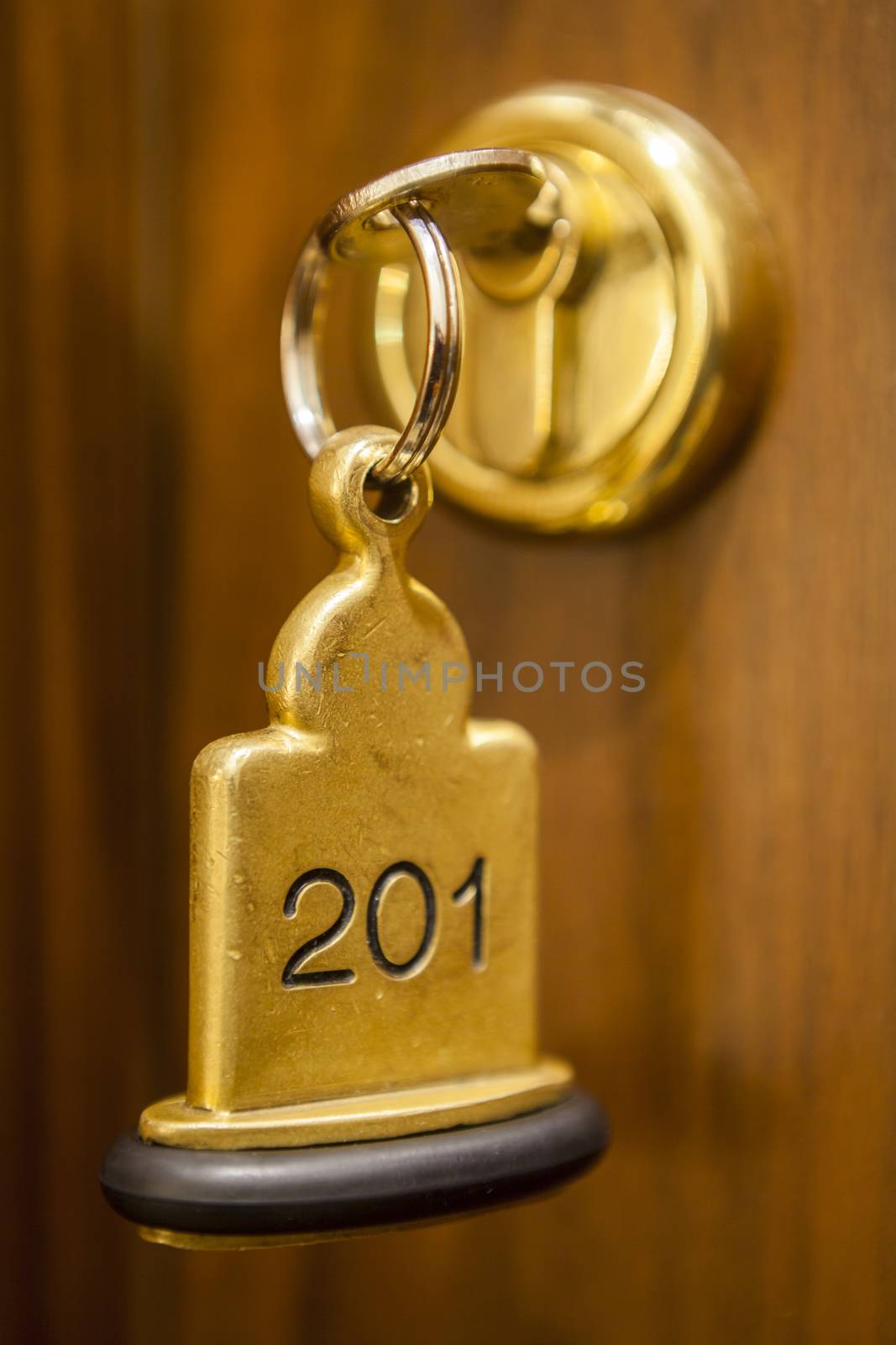 Hotel Room Key lying on Bed with keyring by juniart
