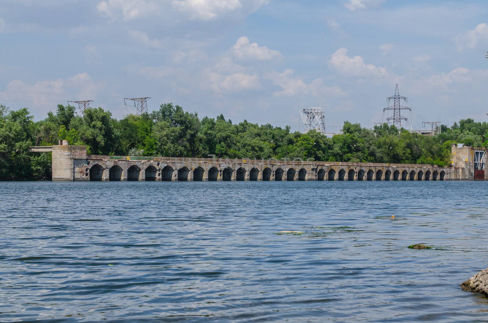 bridge hydroelectric plant on blue sky background
