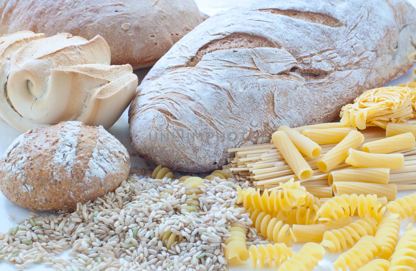 Different varieties of Italian pasta and homemade bread