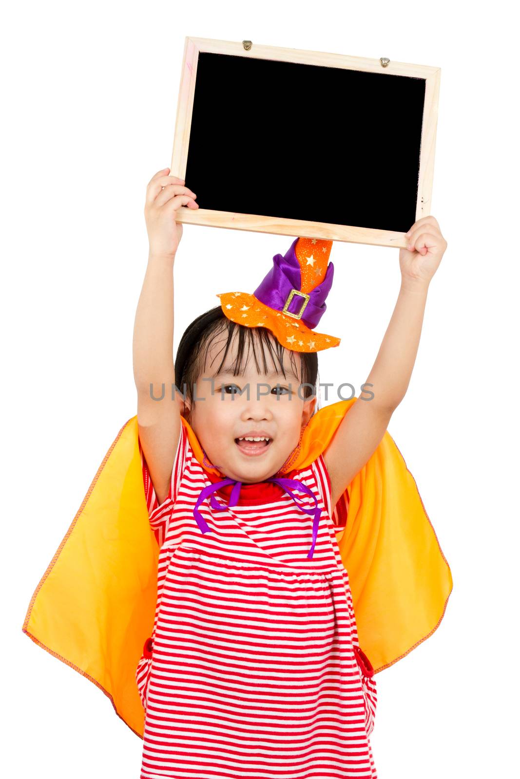 Asian Chinese Little girl celebrate Halloween holding blank black board.