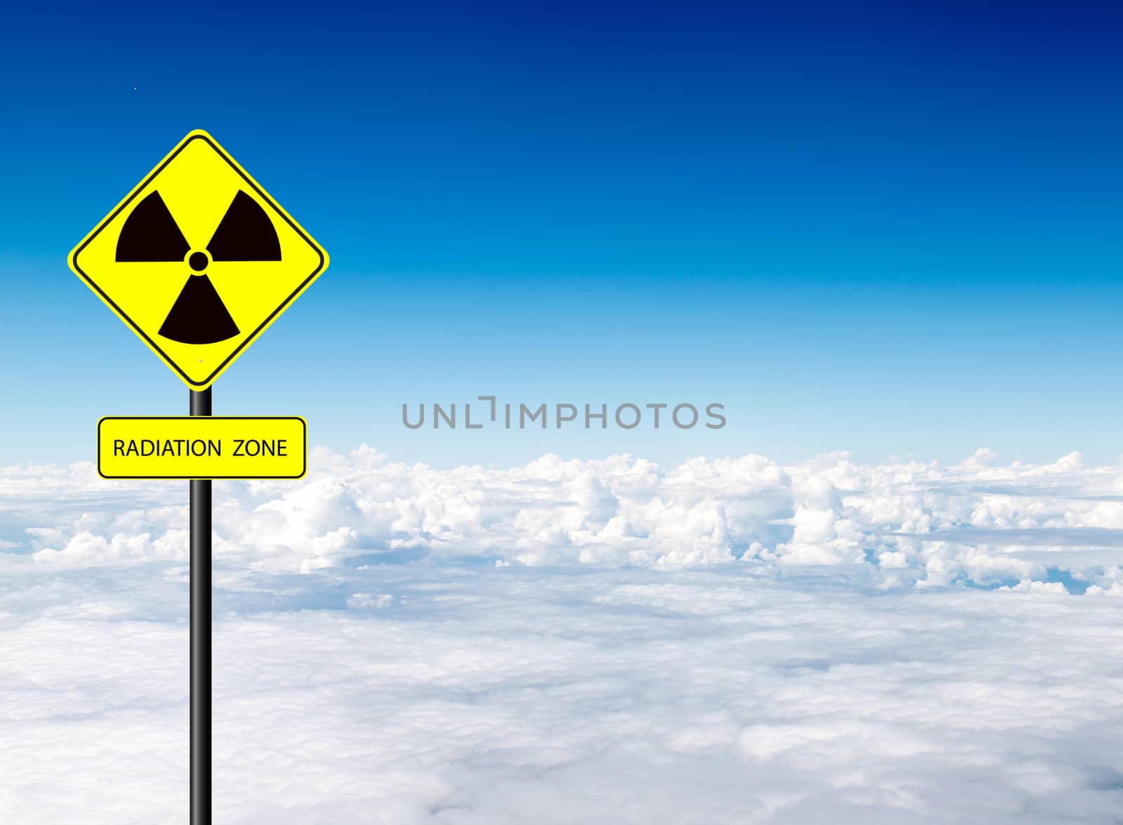 nuclear radiation warning symbol with blue sky