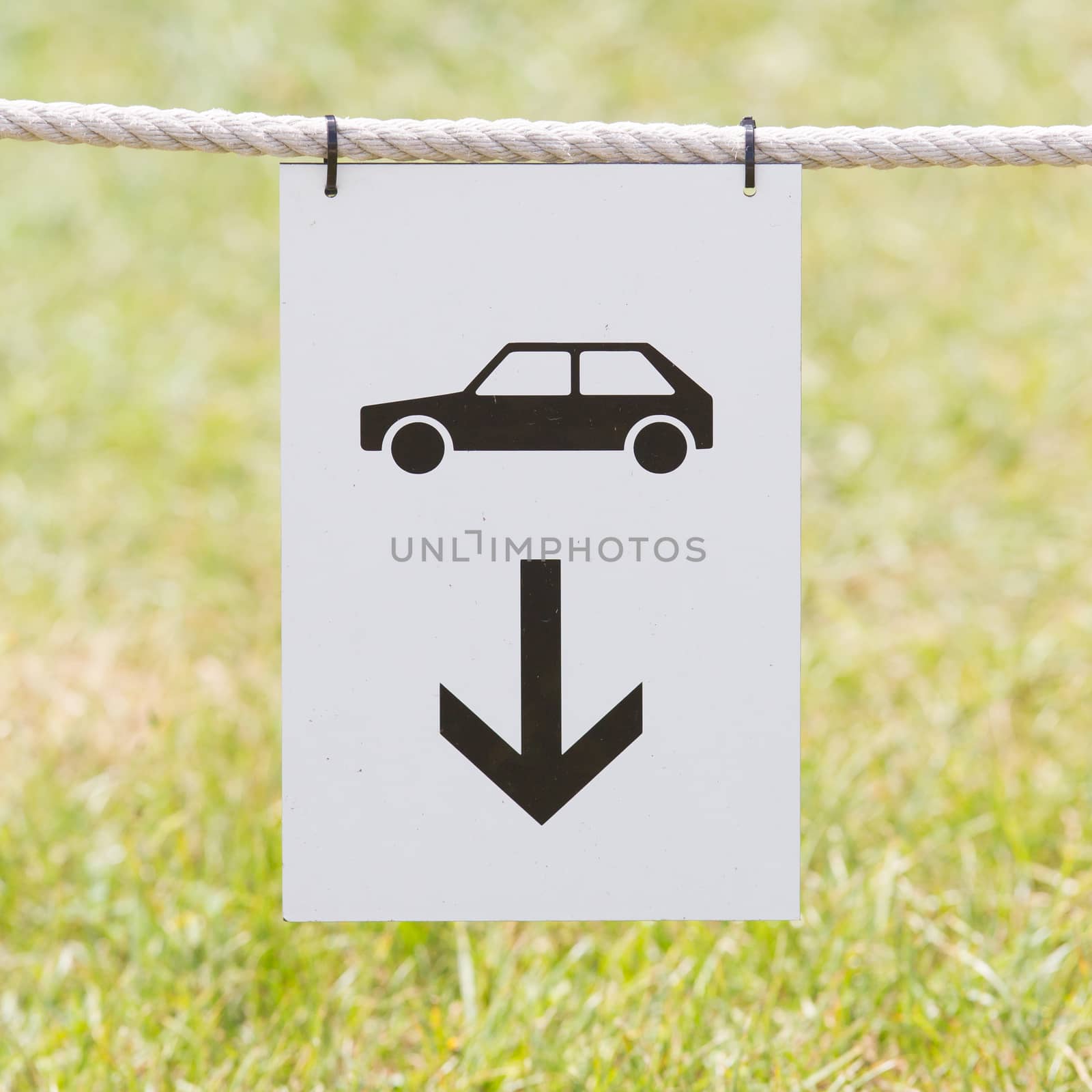 Car parking sign hanging on a rope