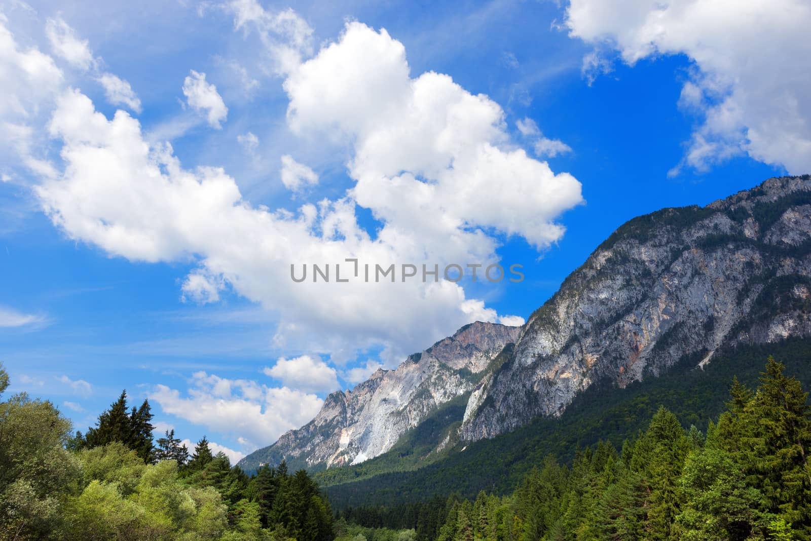 Mountains and green forests in Gail Valley. Carinthia, Austria, Europe