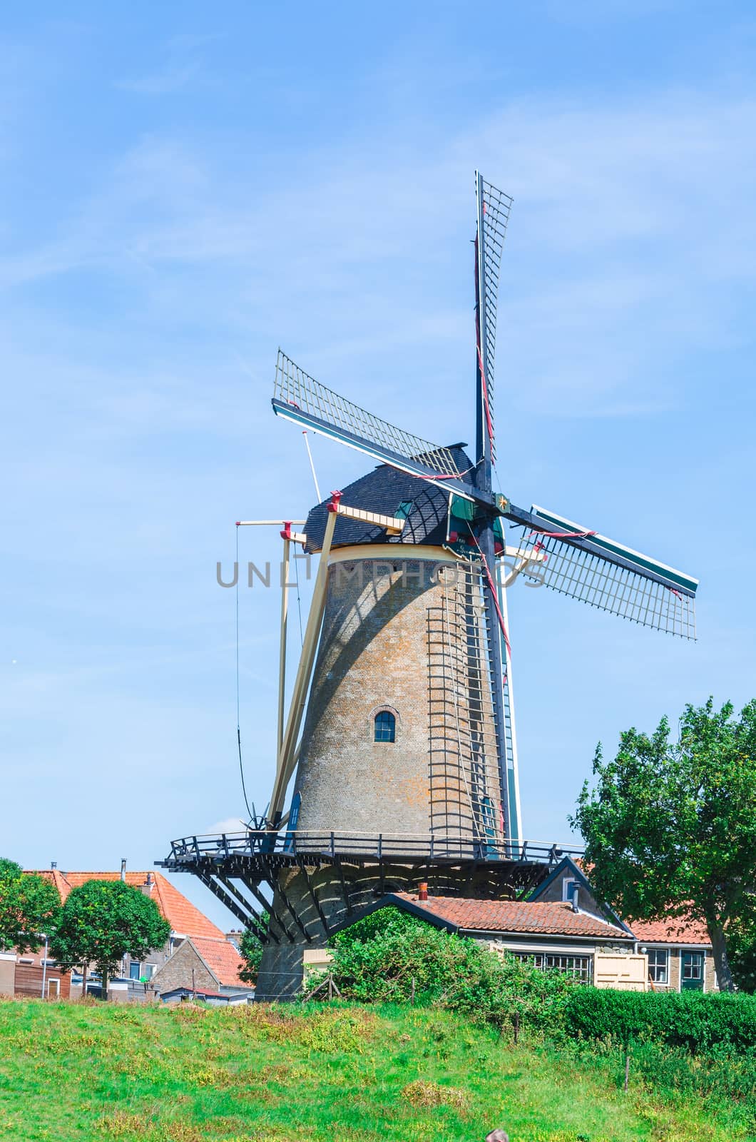 Traditional historic Dutch windmill in Zierikze in the Netherlands.