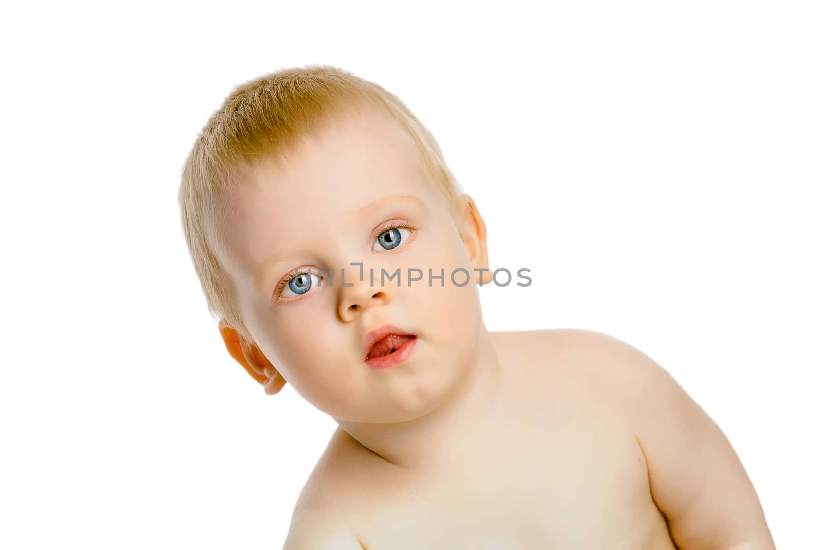 Portrait of a young blue-eyed boy on a white background