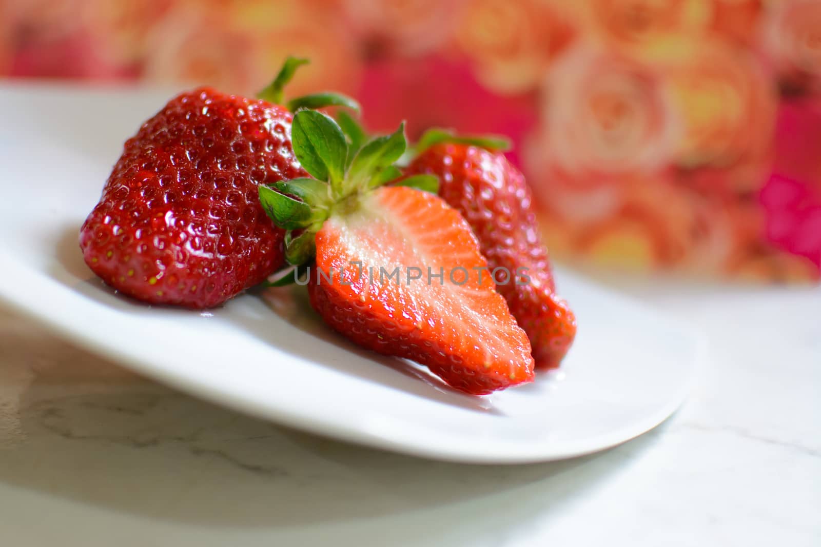 strawberry served on white plate