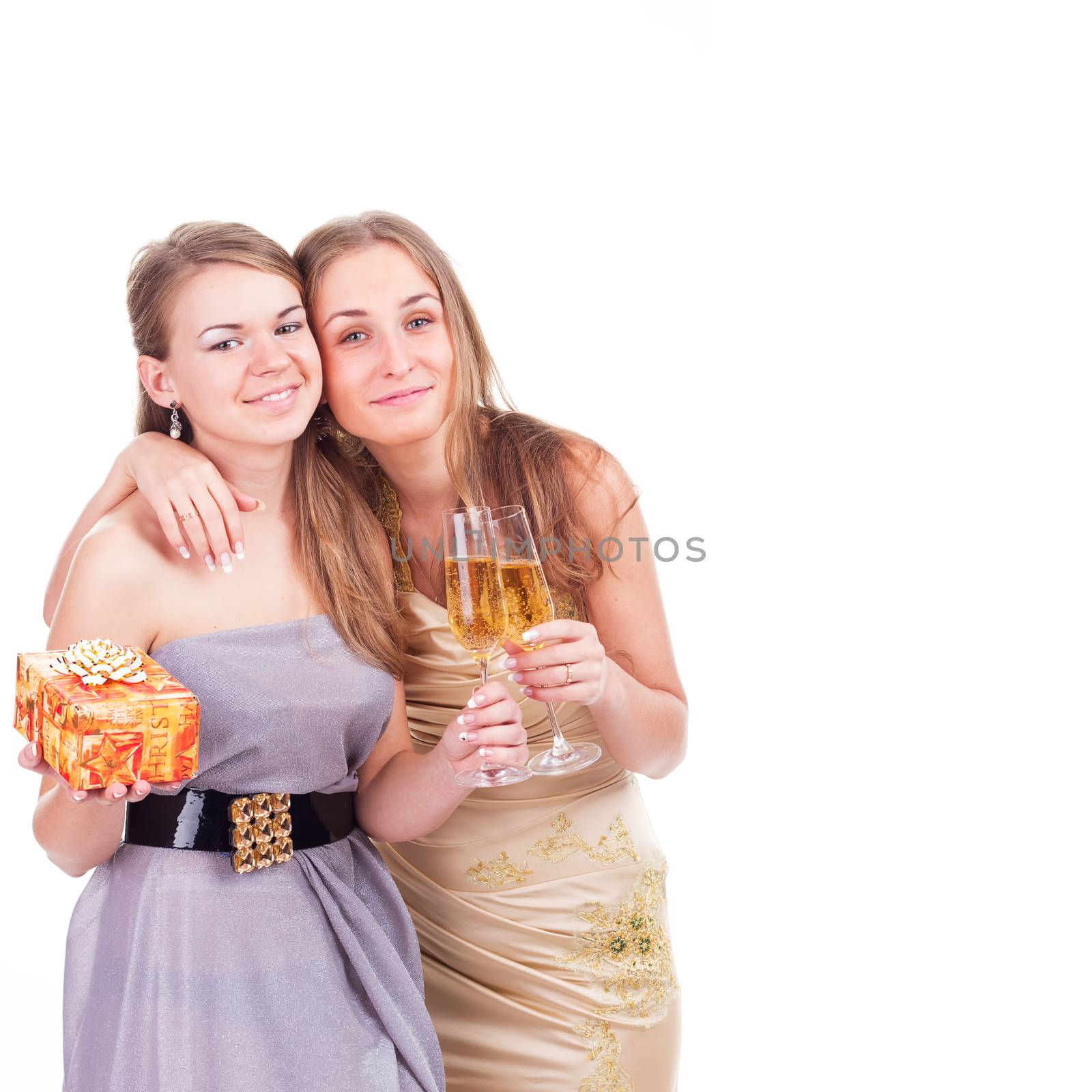 Two young beautiful blonde women celebrating birthday or christmas