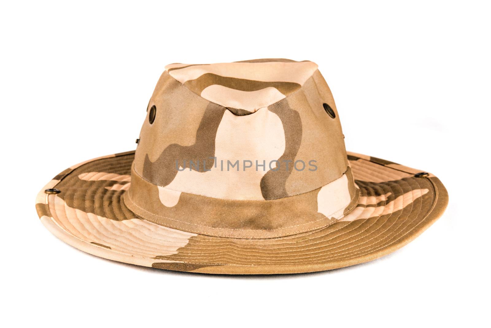 Stylish jungle safari hat with camouflage patterns over white background