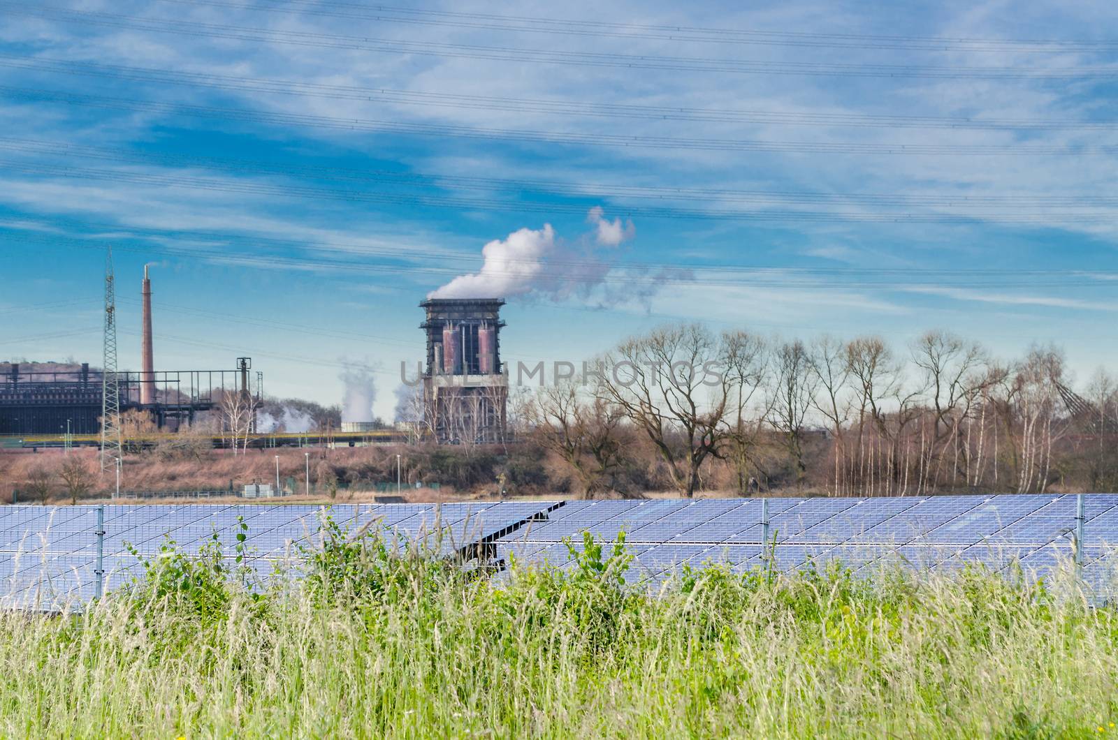 Old power plant with solar panels by JFsPic