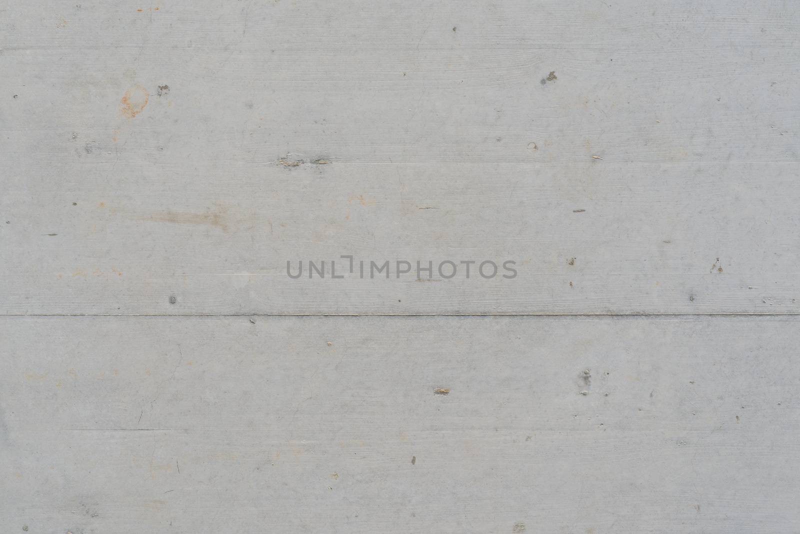 White wood texture background with cracks and nail