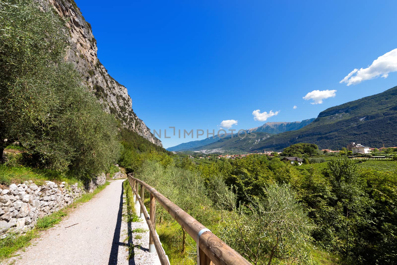 Footpath and mountain bike trail near Arco and the Garda Lake in Sarca Valley (Valle del Sarca) in Trentino Alto Adige, Italy, Europe