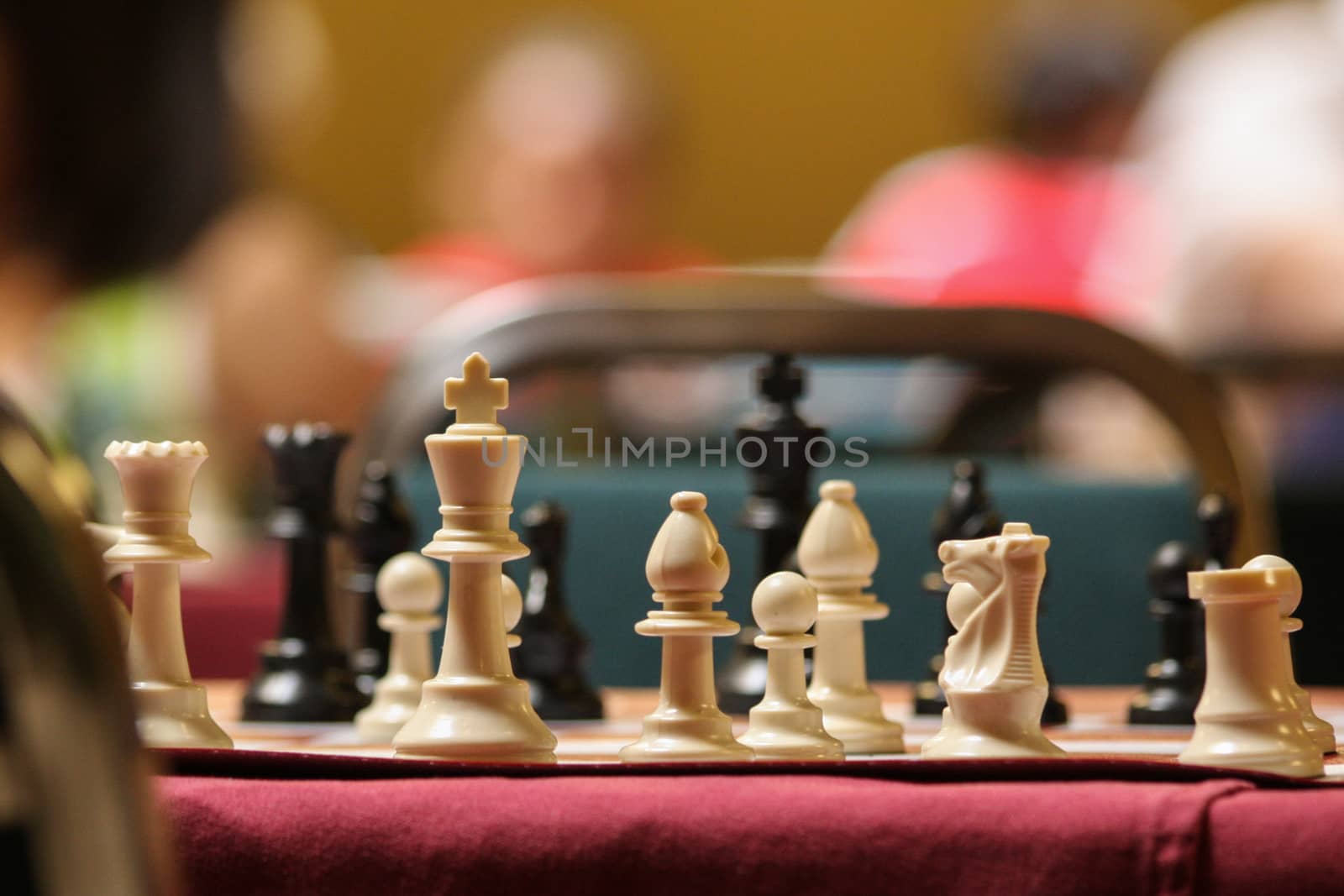 a chess board stands ready for the start of a tournament