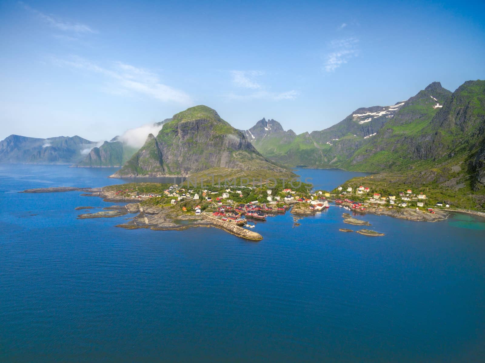 Breathtaking aerial view of scenic fishing village A on Lofoten islands in Norway with traditional red fishing huts