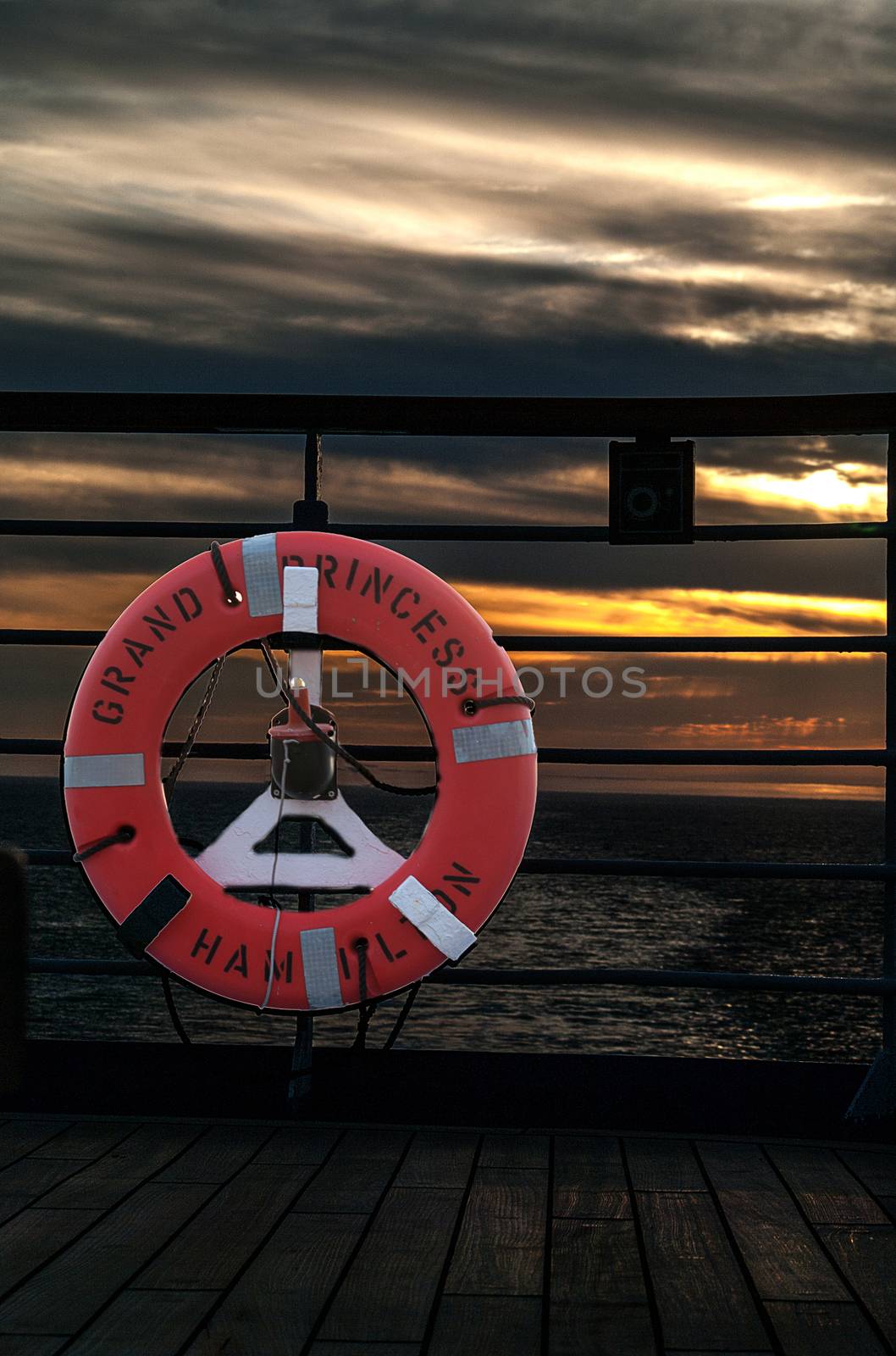 Lifebouy on Cruise Ship at sunset