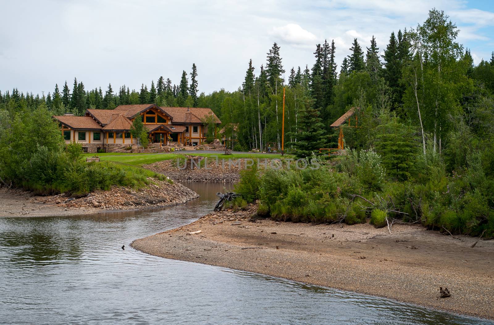 Log Home along the river in Alaska near Fairbanks