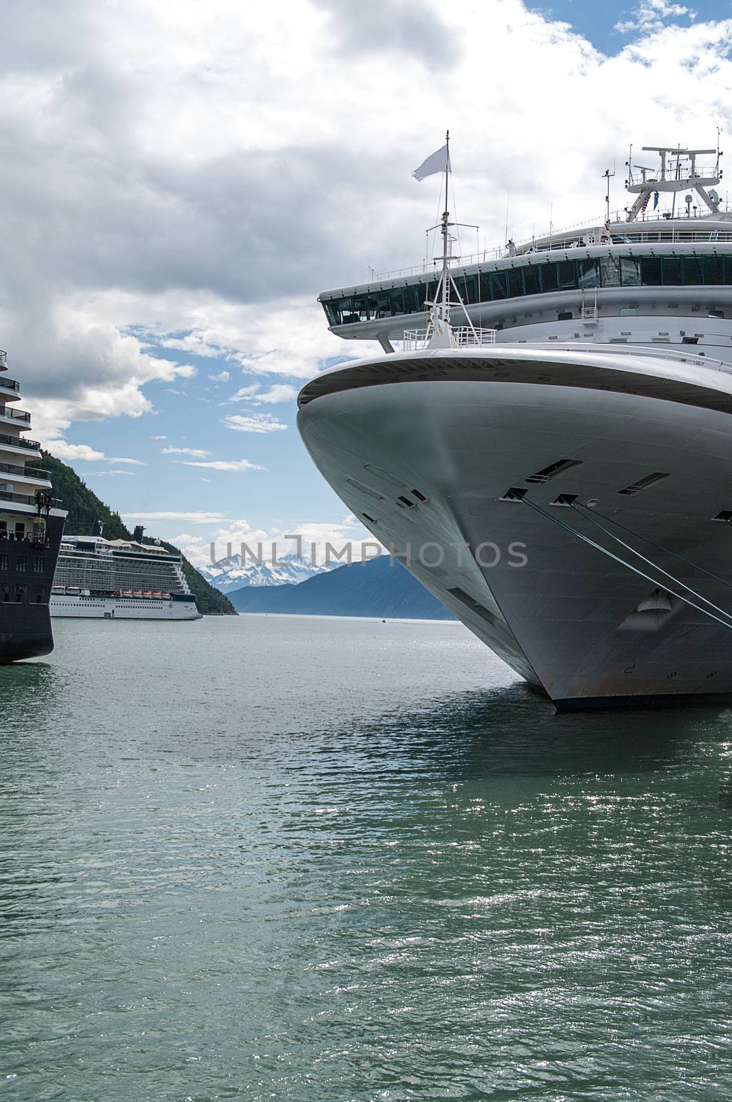 Cruise Ships at Harbour in Skageway with the mountains in the background